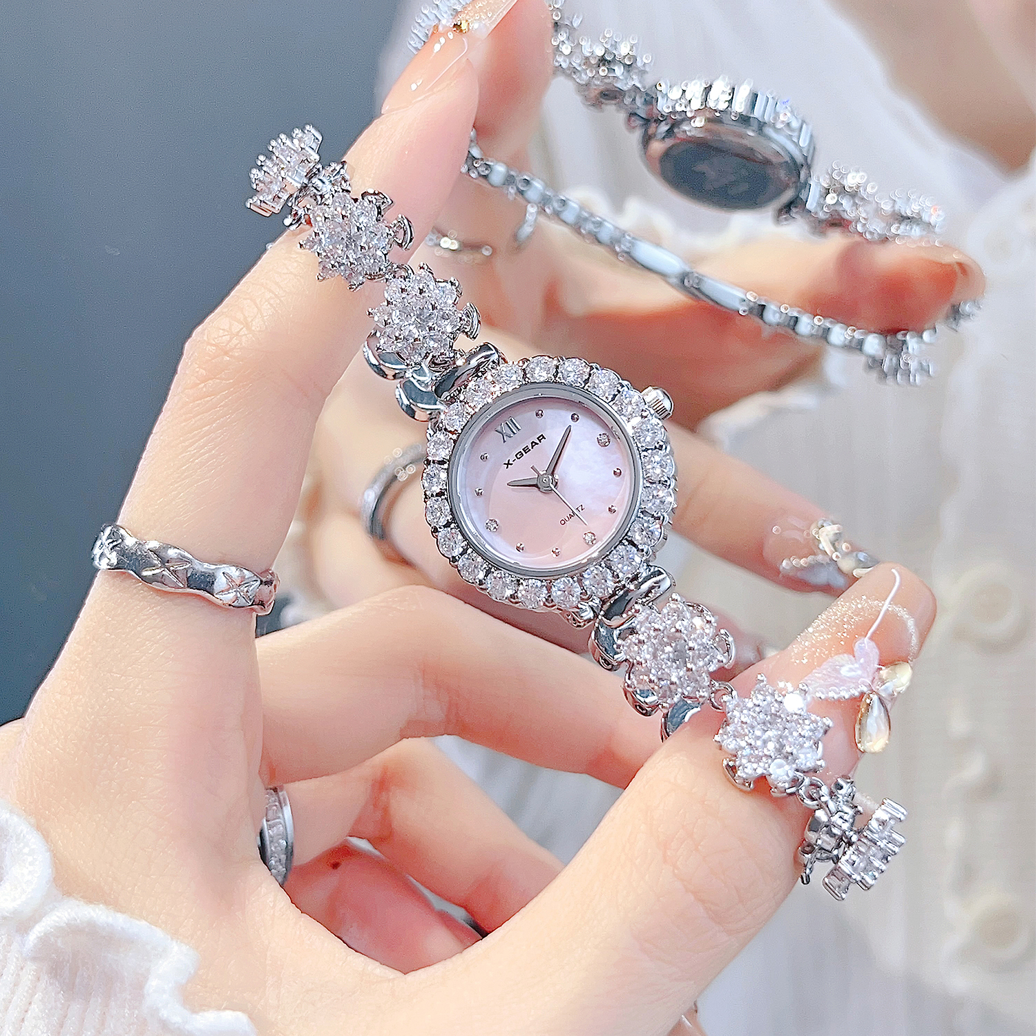 X-GEAR Rotating Camellia Diamo - Luxury X I Watch avaliação e preço